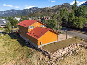 Birds eye view of property with a mountain view