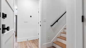 Stairway with wood finished floors