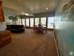 Dining room featuring carpet and recessed lighting