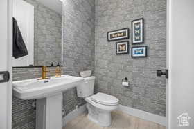 Half bath featuring toilet