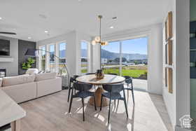 Dining space featuring plenty of natural light, recessed lighting, and a mountain view
