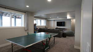 Rec room featuring visible vents, baseboards, carpet flooring, and recessed lighting