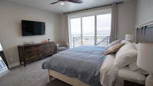 Carpeted bedroom featuring recessed lighting, a ceiling fan, baseboards, and access to outside