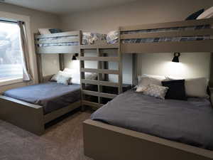 Carpeted bedroom with visible vents