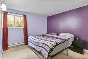 Large master bedroom has walk-in closet and an extra sink area to make mornings easier.