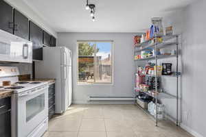 Refrigerator included with matching appliances. *Washer/dryer unit excluded.