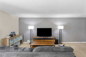 Distinctive modern paint scheme with baseboards and light carpeting throughout.