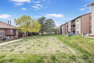 Large grassy space just steps outside for picnics or furry friends.