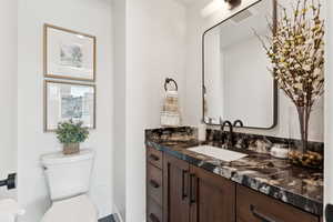 Bathroom with vanity and toilet
