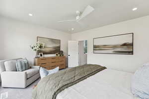 Bedroom with recessed lighting, ceiling fan, and carpet floors