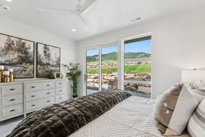 Bedroom with access to outside, carpet, a ceiling fan, and recessed lighting