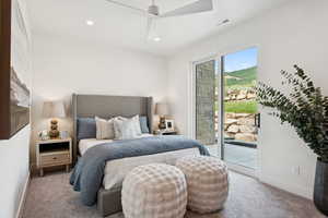 Carpeted bedroom with access to exterior and recessed lighting