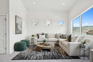 Living room featuring recessed lighting and carpet floors