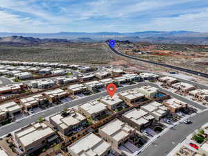 Drone / aerial view with a mountain view and a residential view