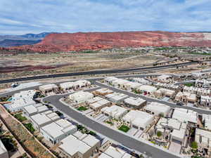 Birds eye view of property featuring a residential view and a mountain view