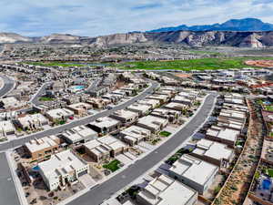 Drone / aerial view with a residential view and a mountain view