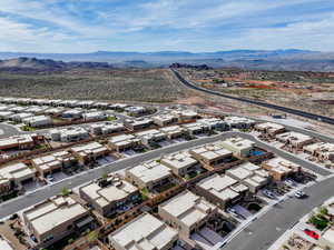 Drone / aerial view featuring a mountain view and a residential view