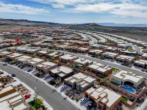 Drone / aerial view featuring a mountain view and a residential view