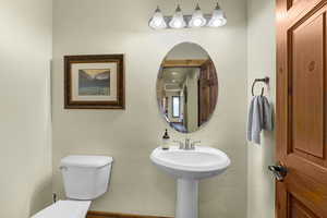 Half bath featuring toilet