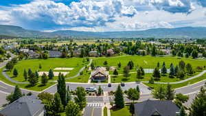 Drone / aerial view featuring a residential view and a mountain view