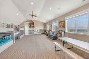 Playroom featuring lofted ceiling, a ceiling fan, carpet flooring, and recessed lighting