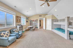 Interior space with recessed lighting, vaulted ceiling, visible vents, and baseboards