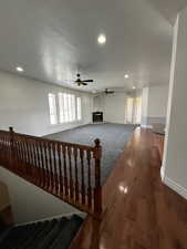 Front Room featuring recessed lighting, fireplace, and ceiling fans