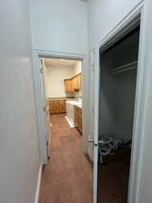Laundry Room Hallway with Large Storage Closet