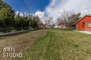 View of yard with fence