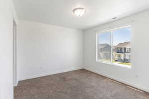 Carpeted spare room