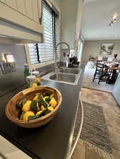 Kitchen with a sink and recessed lighting