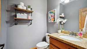 Bathroom with vanity and toilet