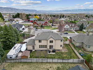 Drone / aerial view with a mountain view and a residential view