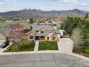 Birds eye view of property with a mountain view
