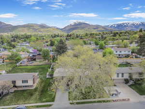 Drone / aerial view featuring a residential view and a mountain view