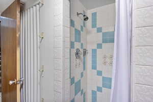 Bathroom featuring a stall shower