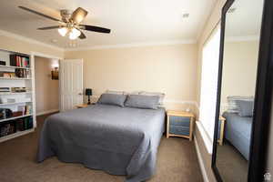 Bedroom with ceiling fan, crown molding,