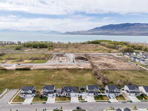 Bird's eye view with a water and mountain view and a residential view