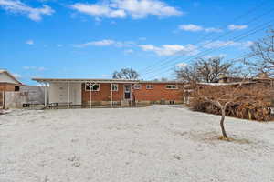 Back of property featuring entry steps