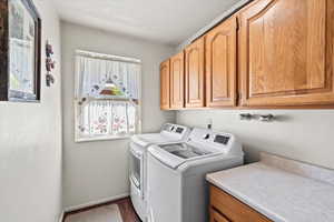 Laundry area with tons of cabinet space