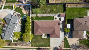 Birds eye view of property with a residential view