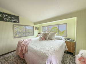 The sunroom is currently being used as a bedroom. Endless possibilities with this fun space.