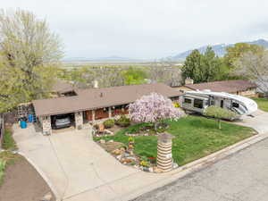 Lots of parking! Driveways on both the left and the right of the property. The RV sits on a 110 foot driveway that feeds into the walkout mother-in-law basement.