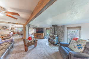 Fantastic open family room complete with wood burning fireplace.