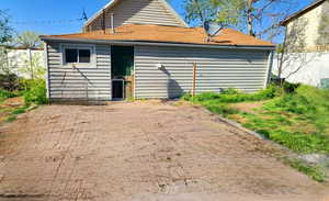 Back of house with a patio area