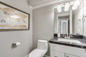 Half bathroom with granite countertops