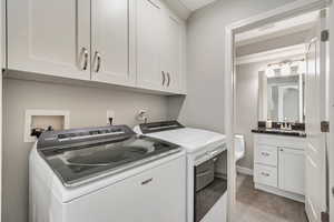 Laundry room with cabinets