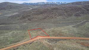 Birds eye view of property with a mountain view