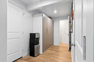 Spacious closet featuring light wood-type flooring