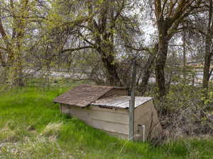 View of outdoor structure featuring an outbuilding